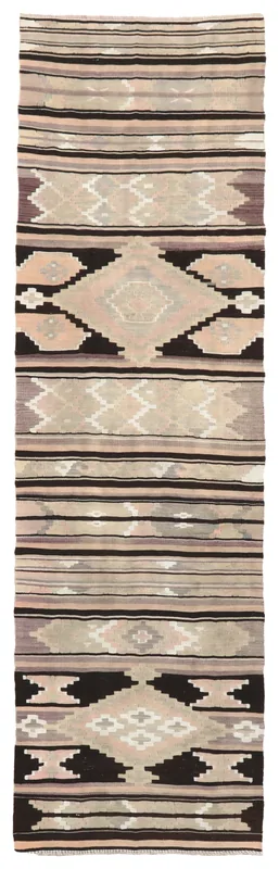 Full top view of the hand-knotted vintage Anatolian runner with geometric patterns on a white background