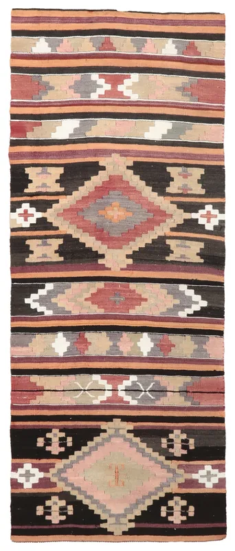 Full top view of the 2'7" x 6'6" Anatolian runner with a black field and geometric patterns