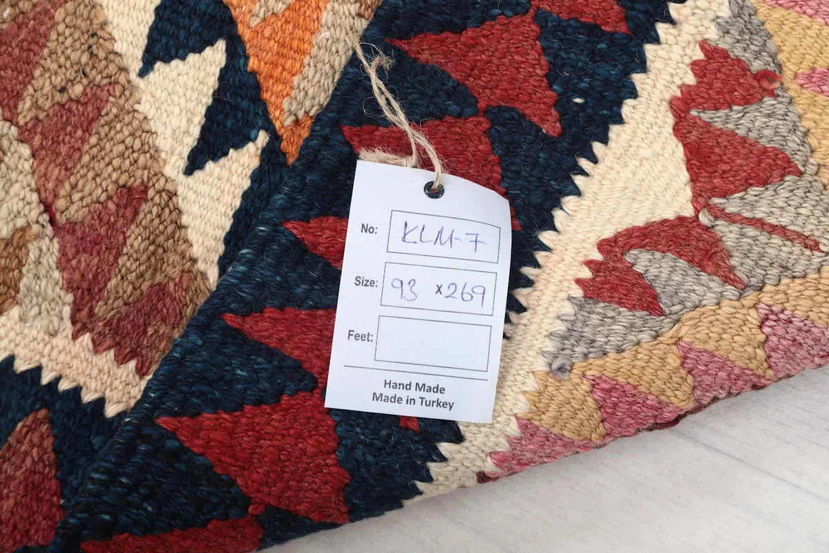Label on the rug indicating its size and origin from Turkey