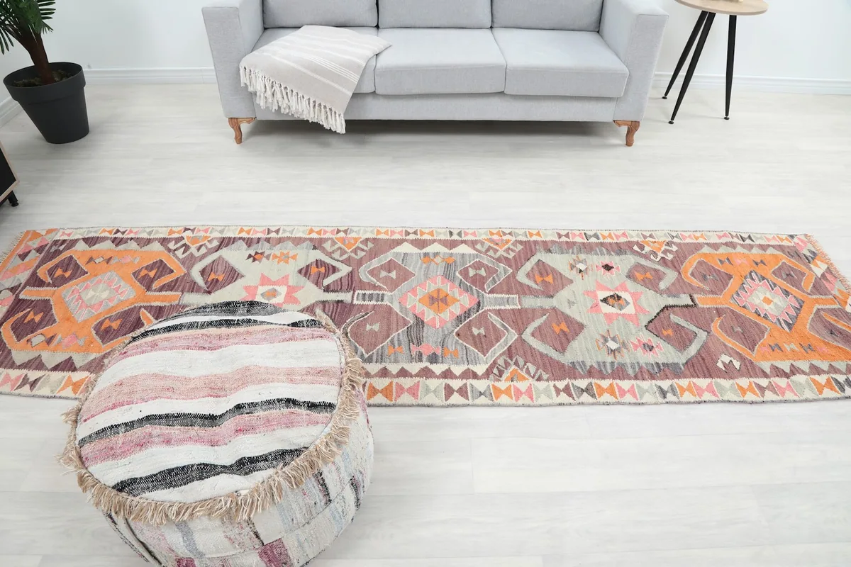 Full overhead view of the runner rug in a room setting, showing its entire length from a higher perspective.