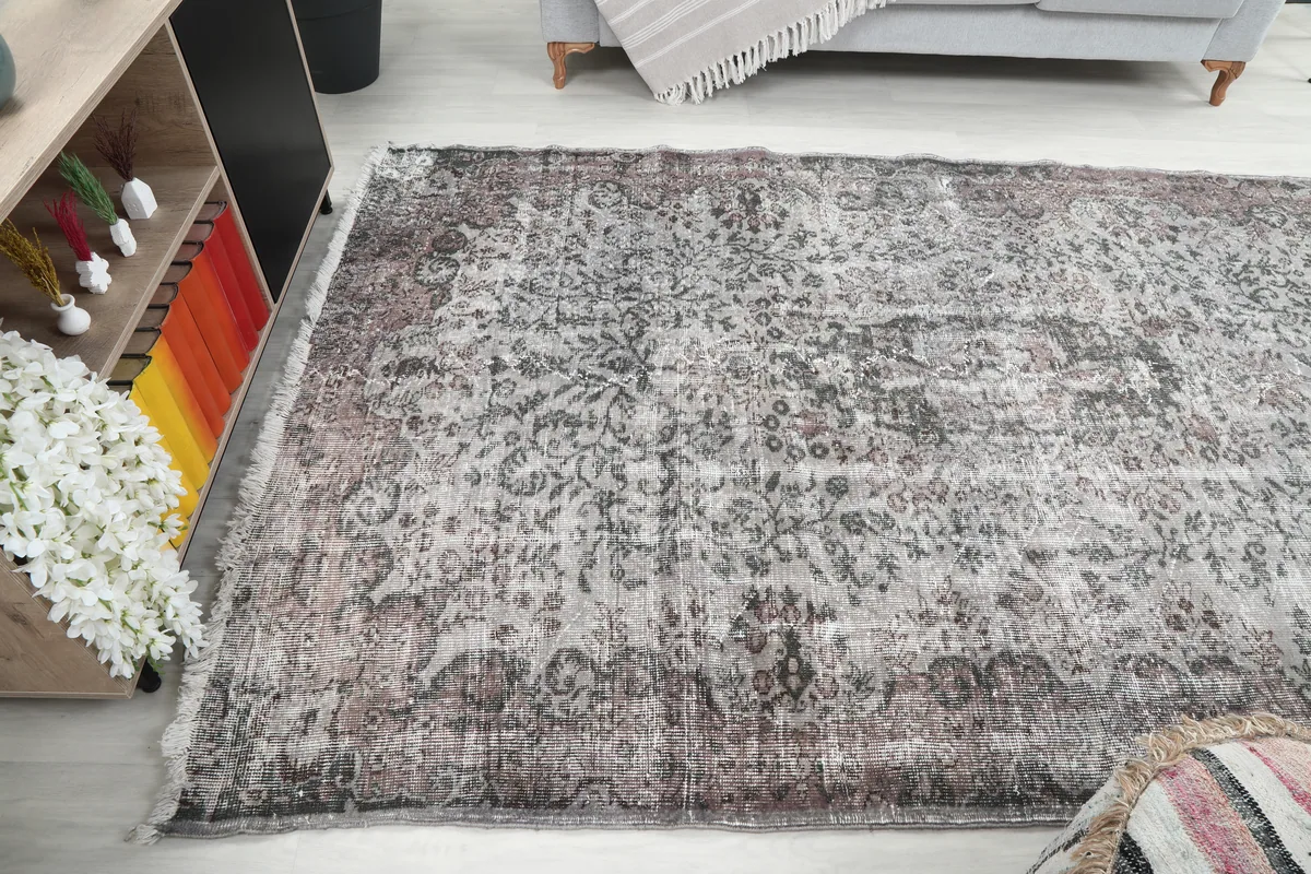 Rose Gray Medallion Rug positioned in a room, showing its full length