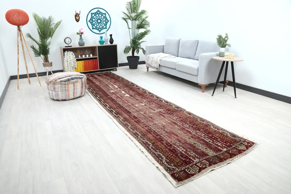 Angle view of the red runner rug showcasing its length in a contemporary living space.