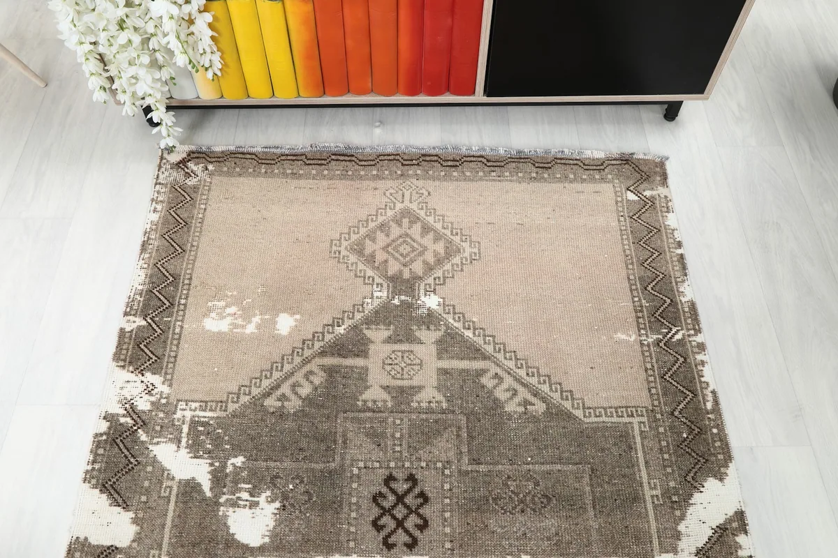 Overhead shot of one end of the runner rug, showing the design and texture