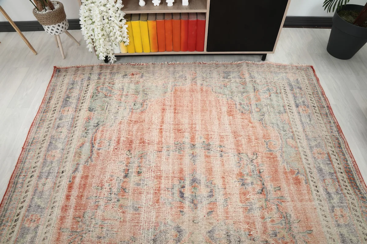 Overhead view showing the rug's full length and the consistent color palette across the field.