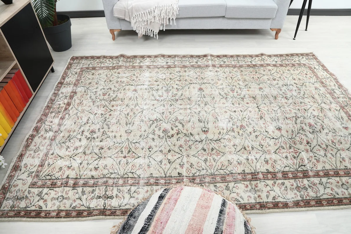 Wide shot of the rug on the floor, showing its presence and fit within the room decor