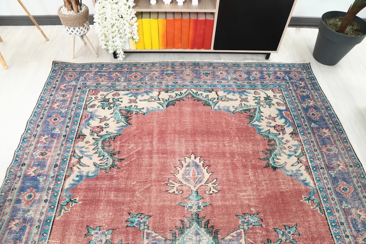 View from above showing the top portion of the rug with its medallion design