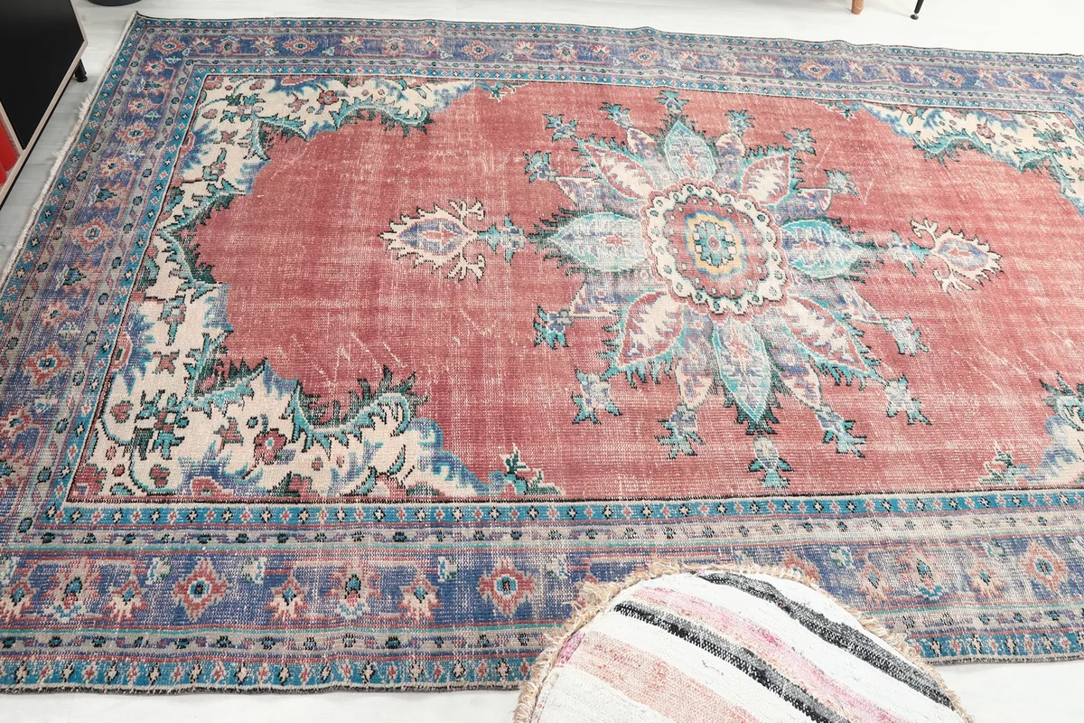 Overhead view of the rug showing its overall pattern and color distribution