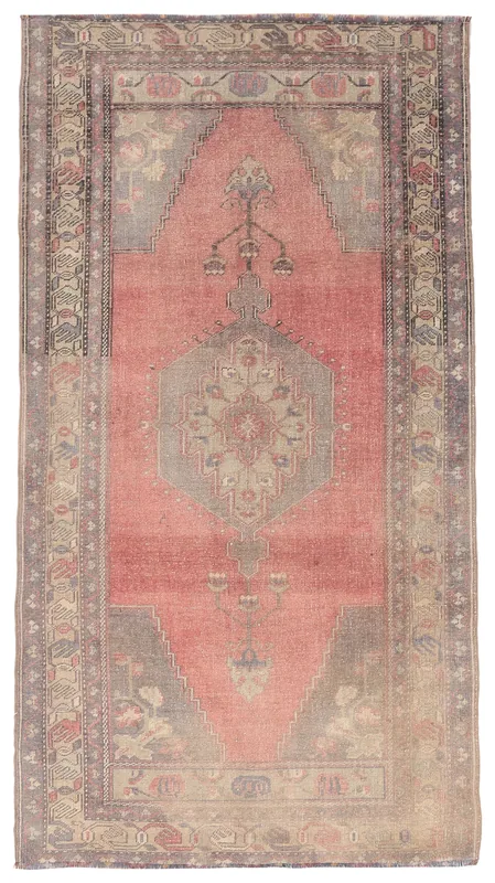 Full top view of the vintage rose and gray Anatolian rug on a white background.
