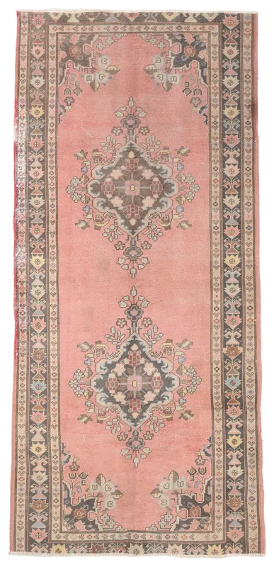 Full top view of the 4'8" x 10'2" vintage rose Anatolian runner rug