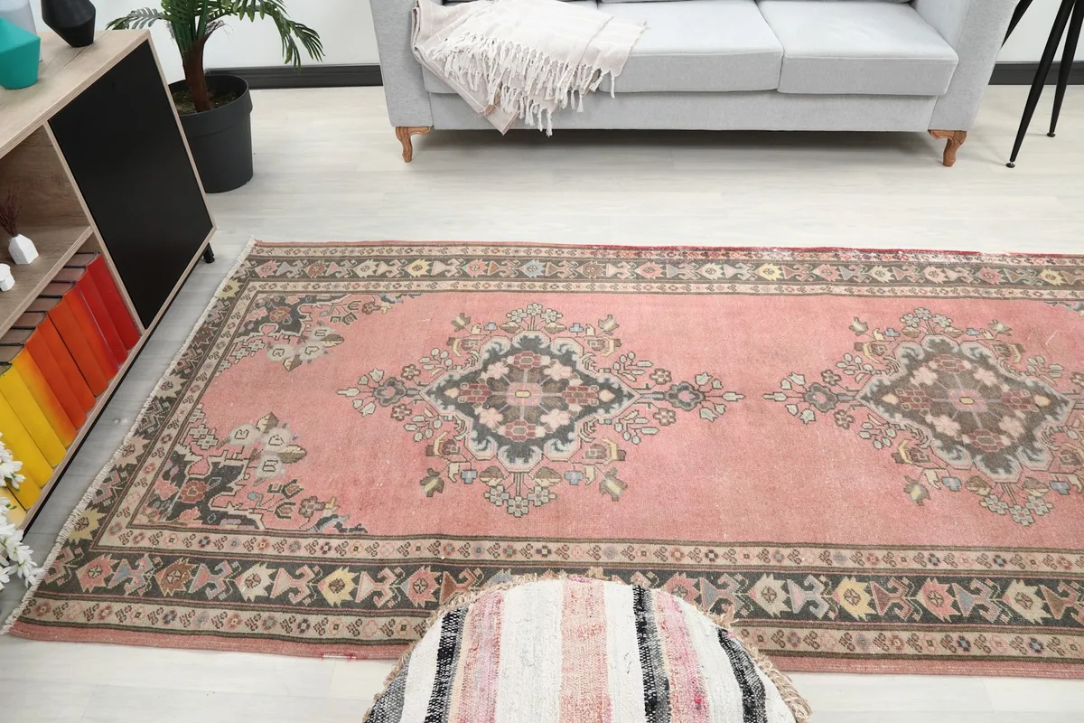 Room view from above, showing the full length of the runner rug in context