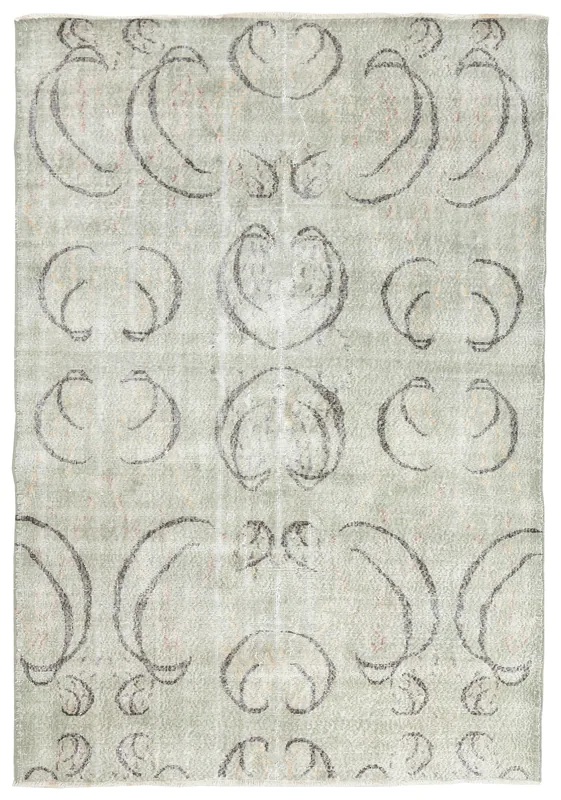 Full top view of the 5'8" x 8'4" green vintage Anatolian rug with abstract charcoal patterns on a white background.