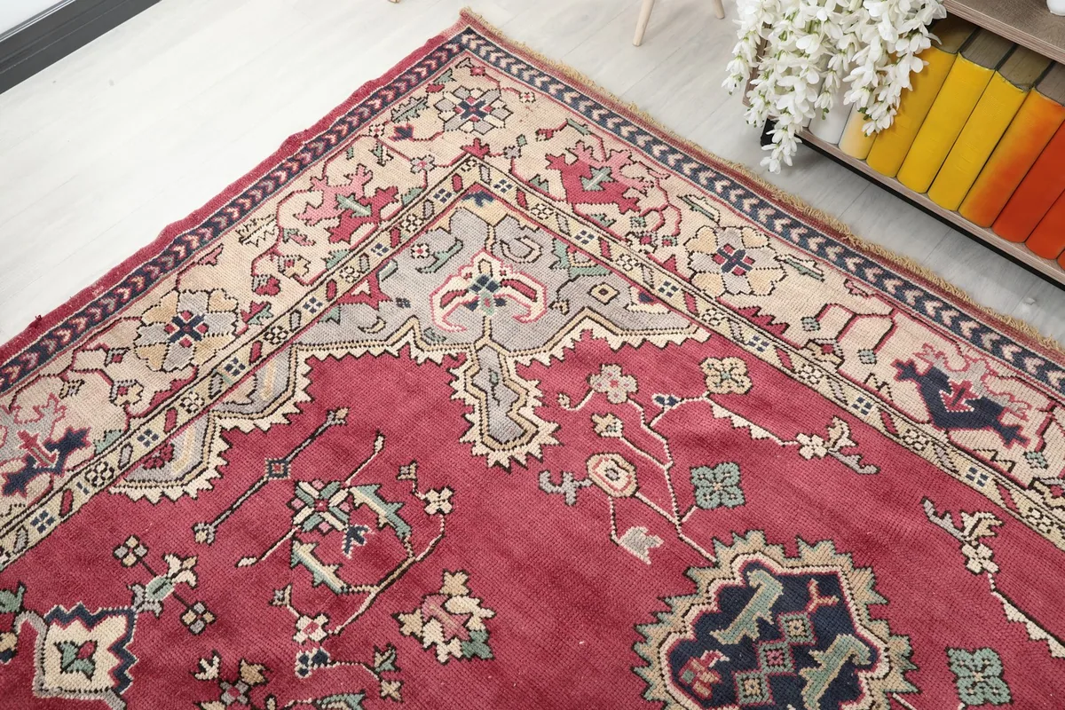 Detailed view of the outer border and corner of the rug, showing intricate patterns