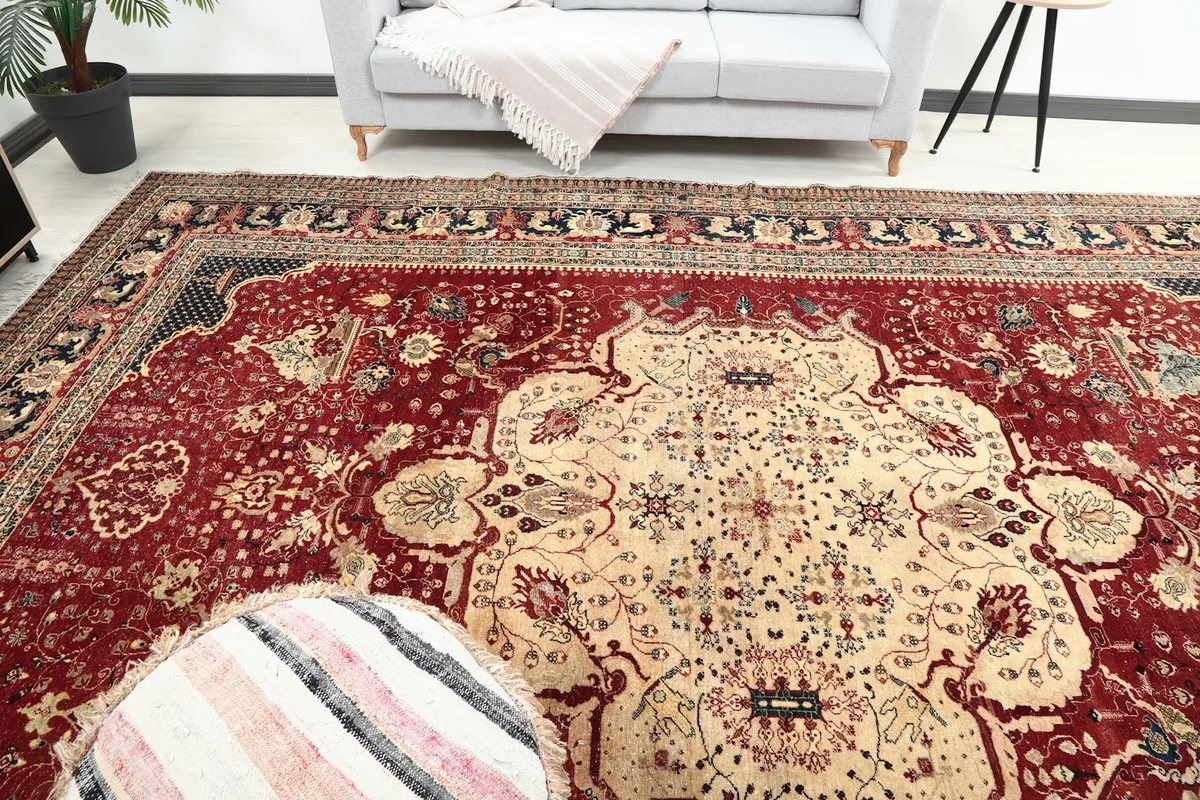 View of the oversized rug in a room, capturing the medallion and surrounding patterns