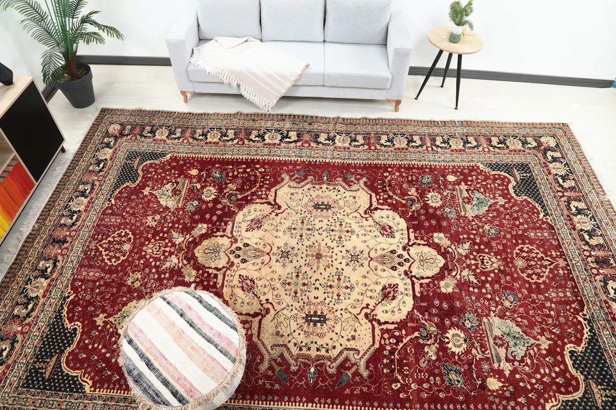 Full view of the 11'6" x 14'11" vintage Anatolian rug in a staged room setting