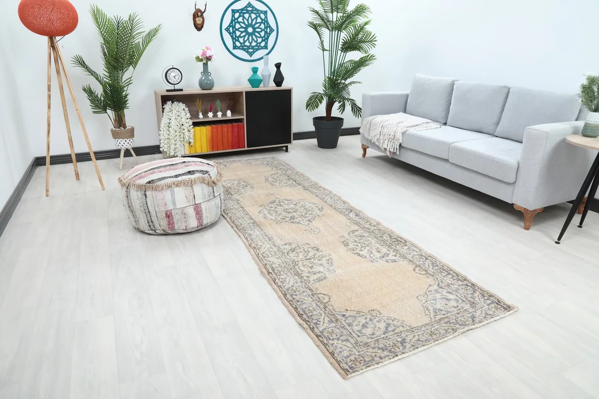 Angled view of the runner rug in a room, showing its length and how it complements the decor.