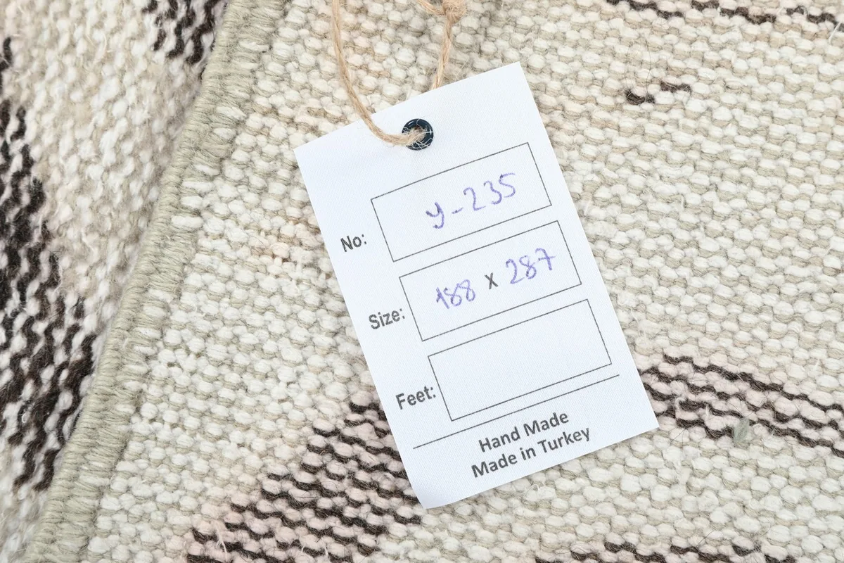 Product tag showing item number and dimensions for the Anatolian rug