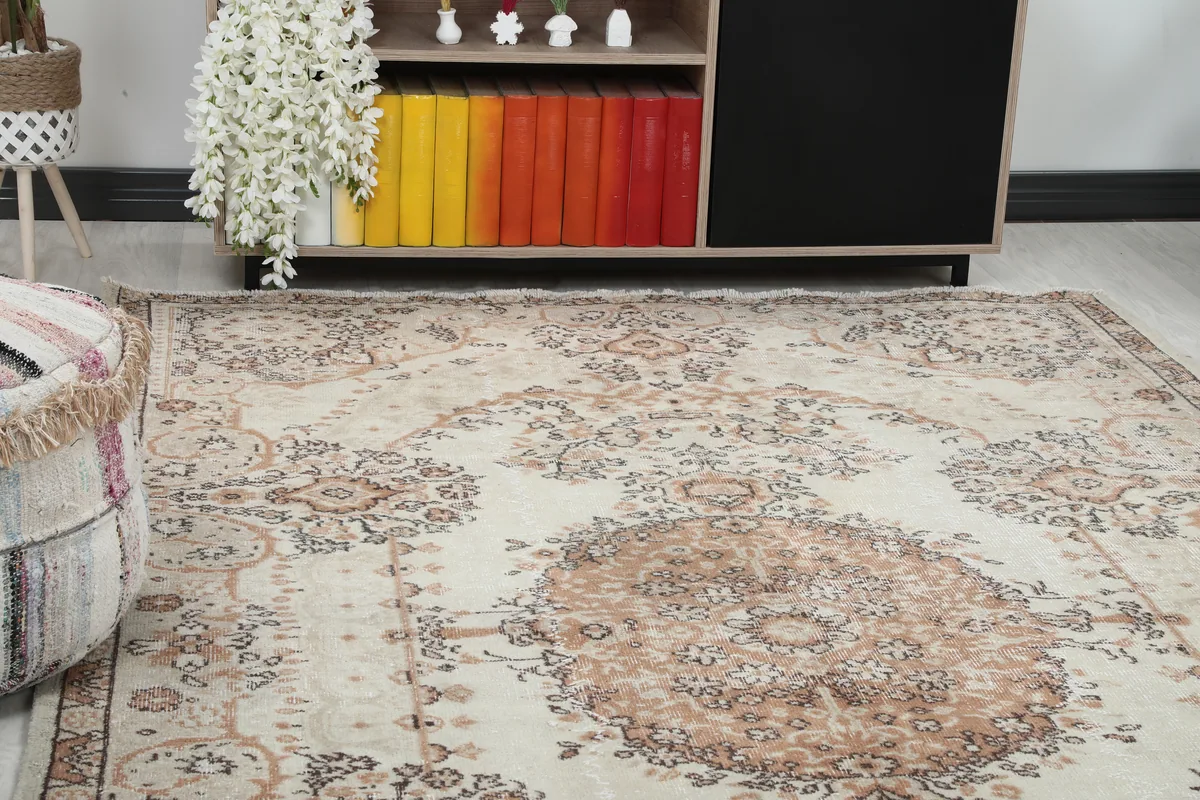 Close-up view of the Cream Rust Medallion Anatolian Rug's central medallion and surrounding patterns.