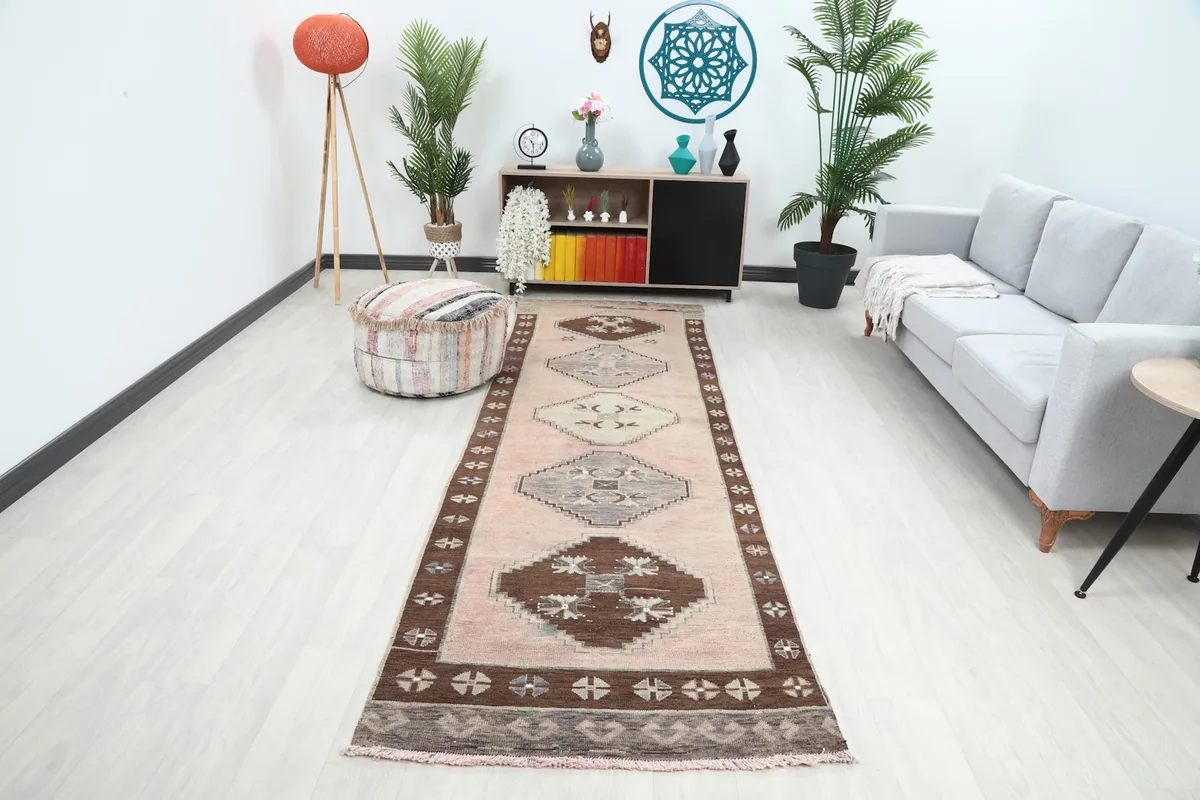 Runner rug displayed in a bright hallway setting with modern furniture