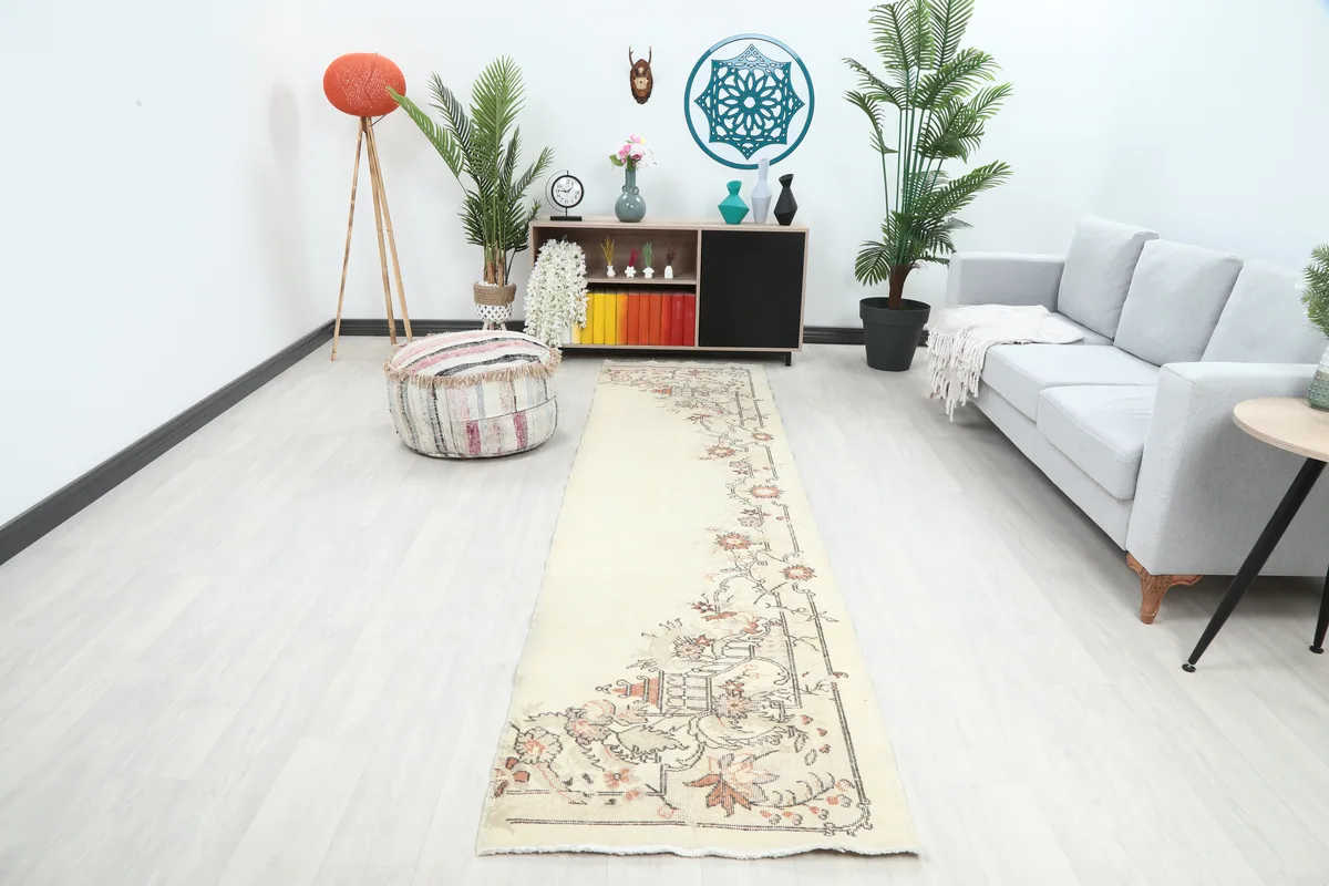Cream Rose Floral Anatolian Runner in a modern room setting, showcasing its length and design.