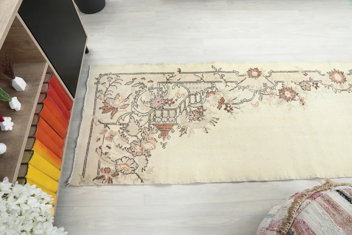 Angled view of the Cream Rose Floral Anatolian Runner, showing the full width of the floral design.