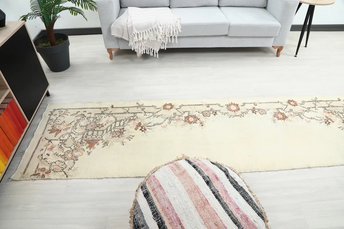 Cream Rose Floral Anatolian Runner laid out in a room, offering a perspective of its length and scale.