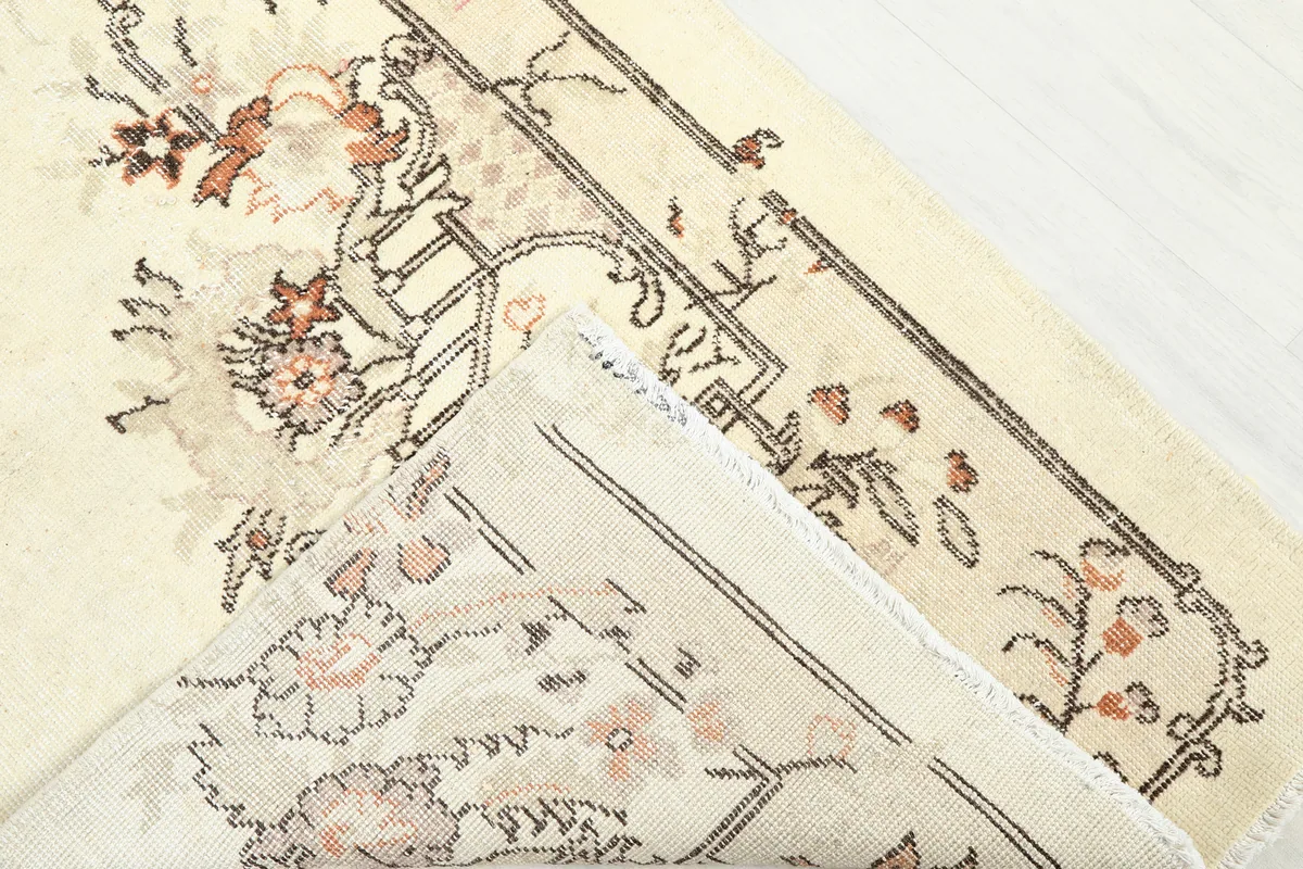 View of the Cream Rose Floral Anatolian Runner's back, showing the cotton foundation and hand-knotted construction.