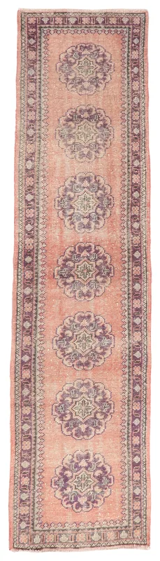 Full top view of the rose and purple geometric medallion Anatolian runner rug