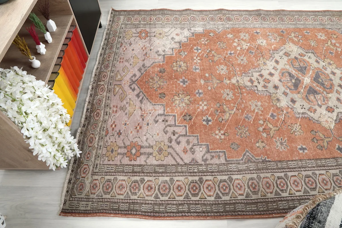 Angled shot from above, showcasing the full length of the rug and its color variations.