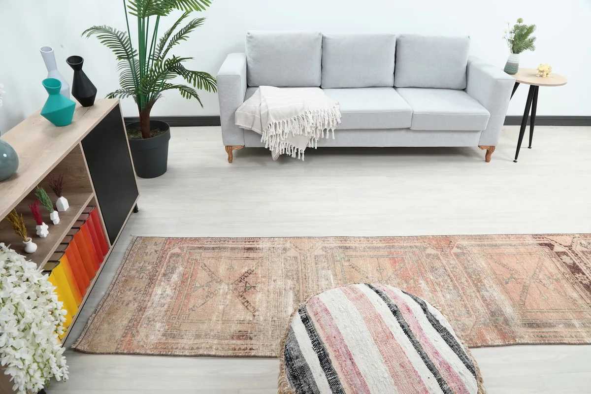 Wide shot of the runner rug extending into a living area, demonstrating its suitability for long spaces.
