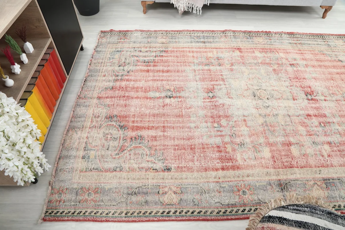 Wide-angle view of the rug's surface, capturing its overall texture and color variation