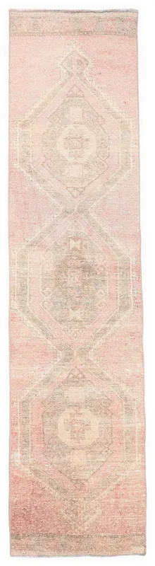 Top view of the 2'6" x 10'8" rose and gray geometric Anatolian vintage runner