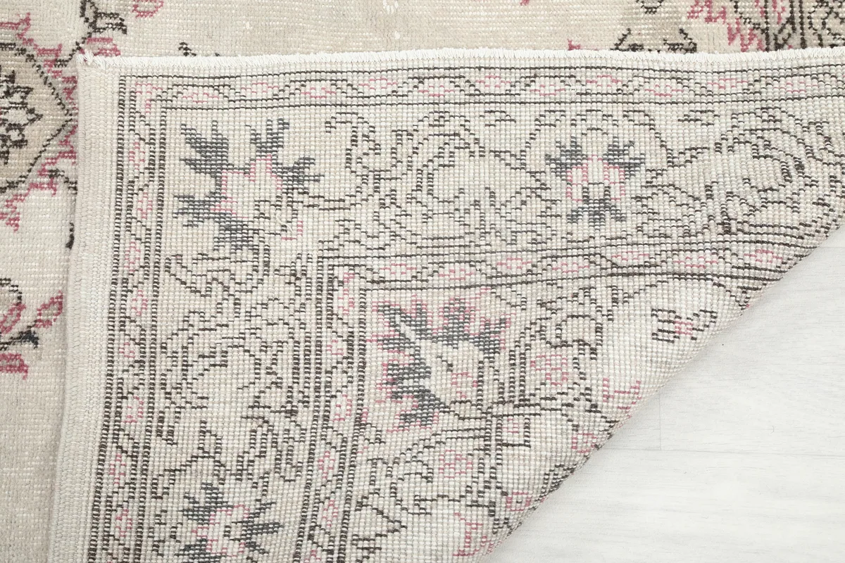 Another view of the back of the Ivory Rose Medallion Anatolian Rug, showing the tight hand-knotting.
