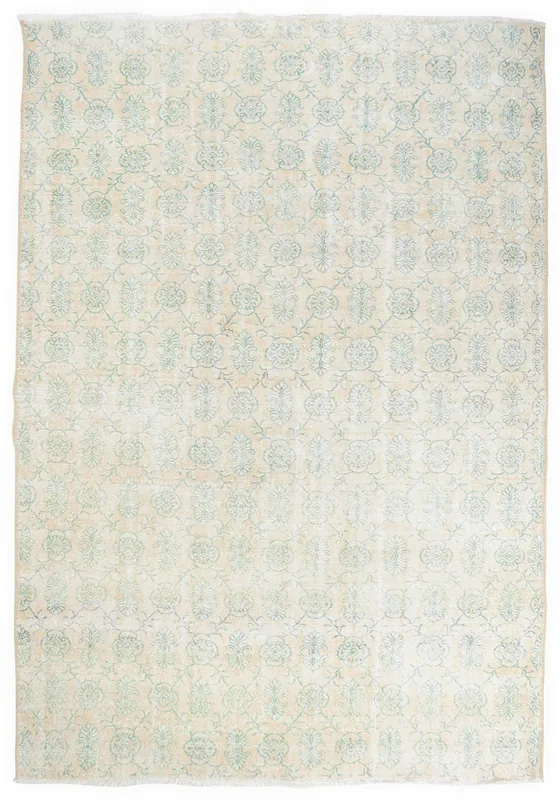 Full overhead view of the beige and green floral vintage Anatolian rug