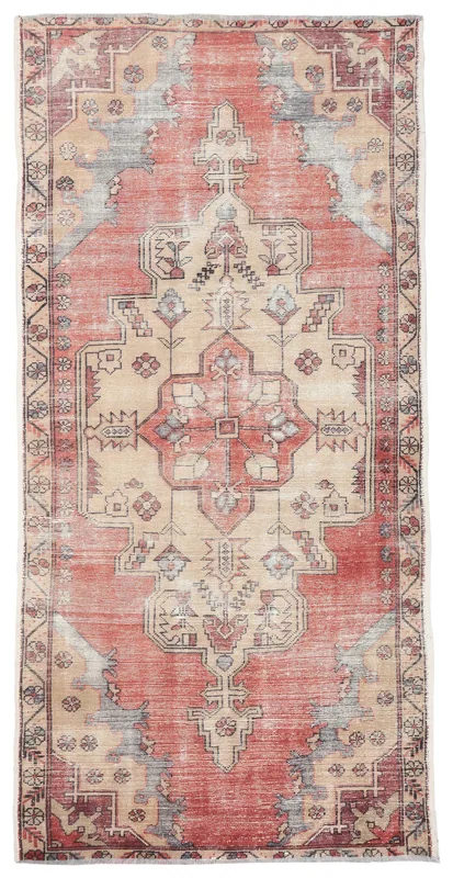 Full overhead view of the 4'1" x 8'4" vintage red and beige Anatolian area rug