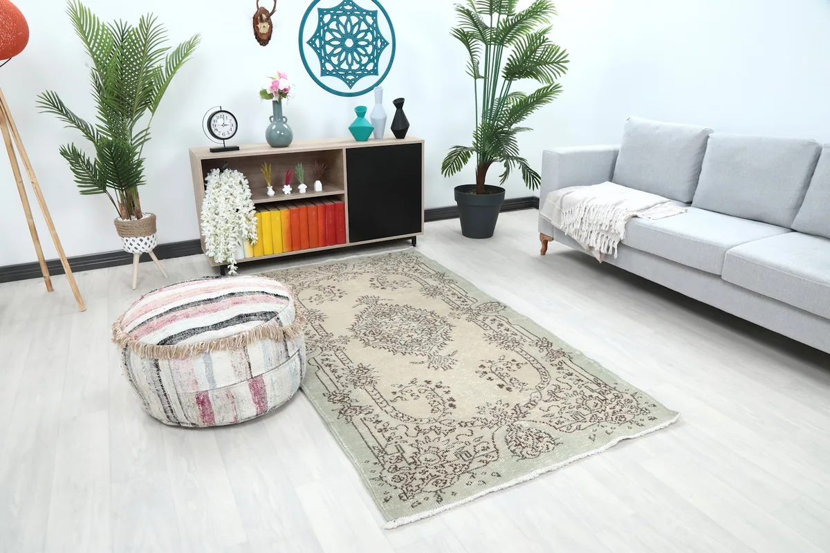 Angle view of the rug in a living room, showing its placement relative to furniture