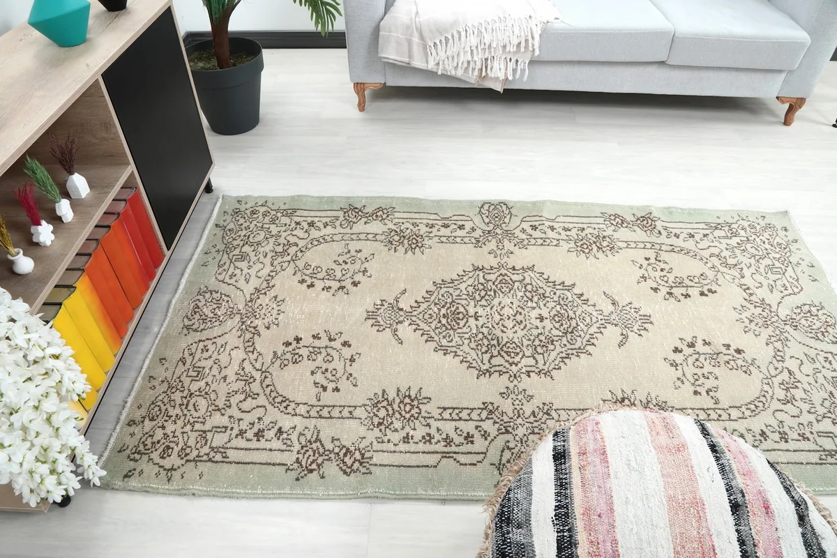 Wider view of the rug in the living room, showing its overall proportion in the space