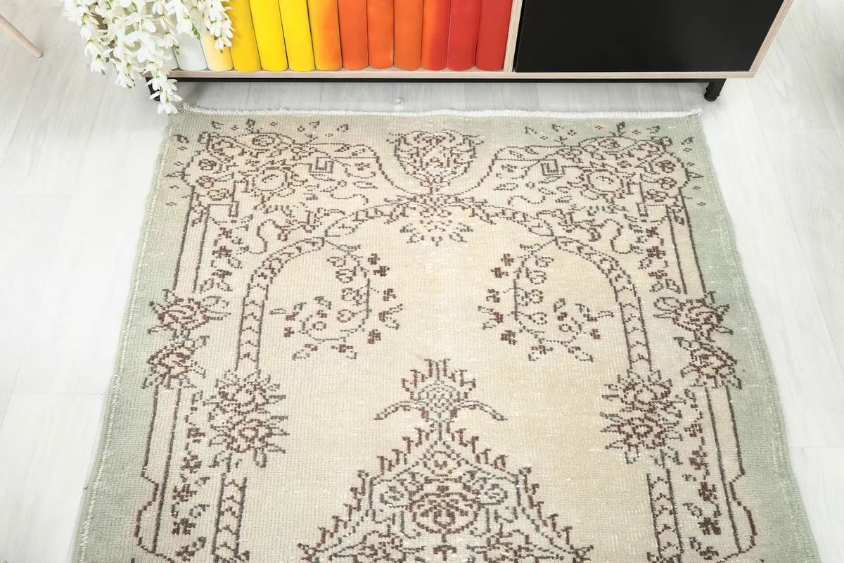 Overhead view of the rug's upper half, displaying the symmetrical design