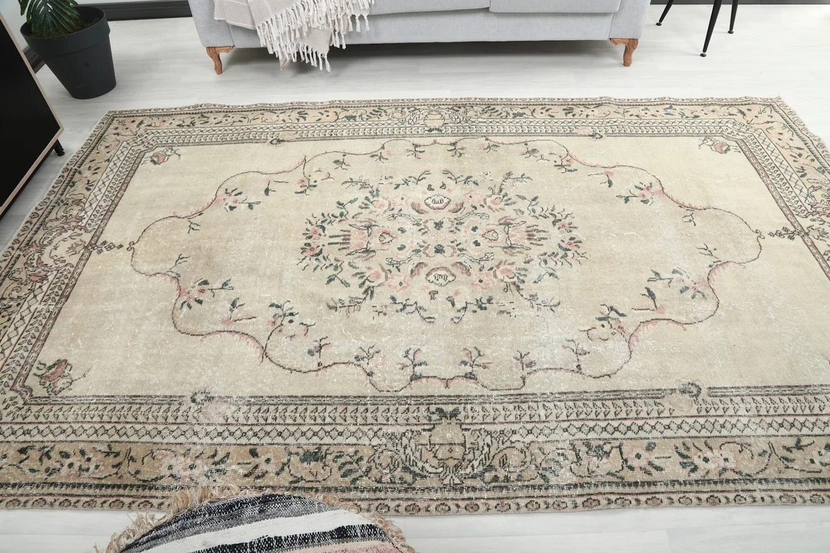 Overhead view of the rug placed in a room, showing its full design and scale