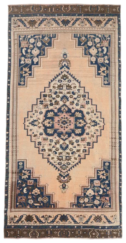 Full top view of the beige and navy vintage Anatolian area rug