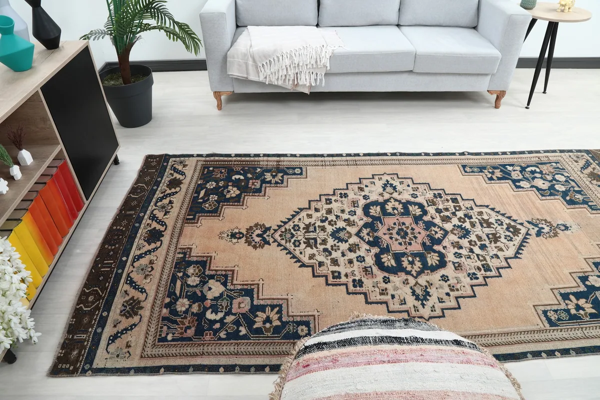 Wide shot of the rug in a living room, showcasing its placement and scale