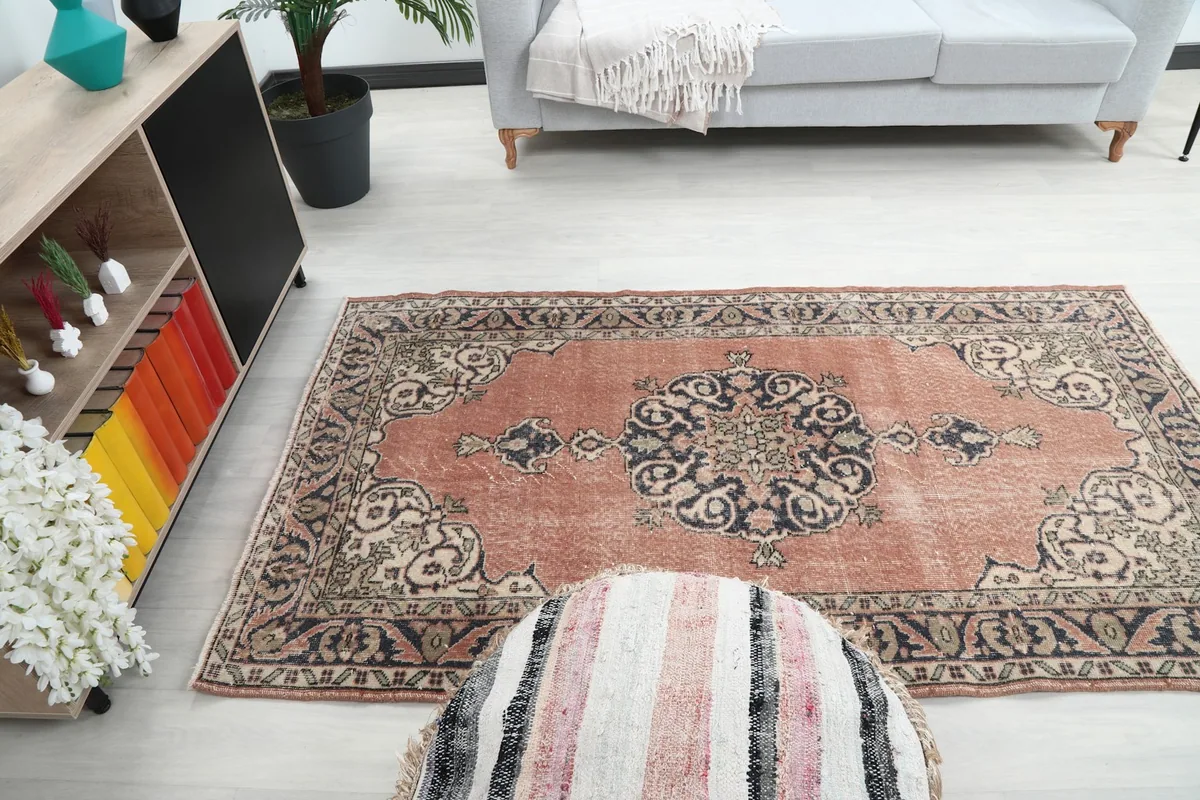Full room view with the rug centered, showing its size and impact within the space.