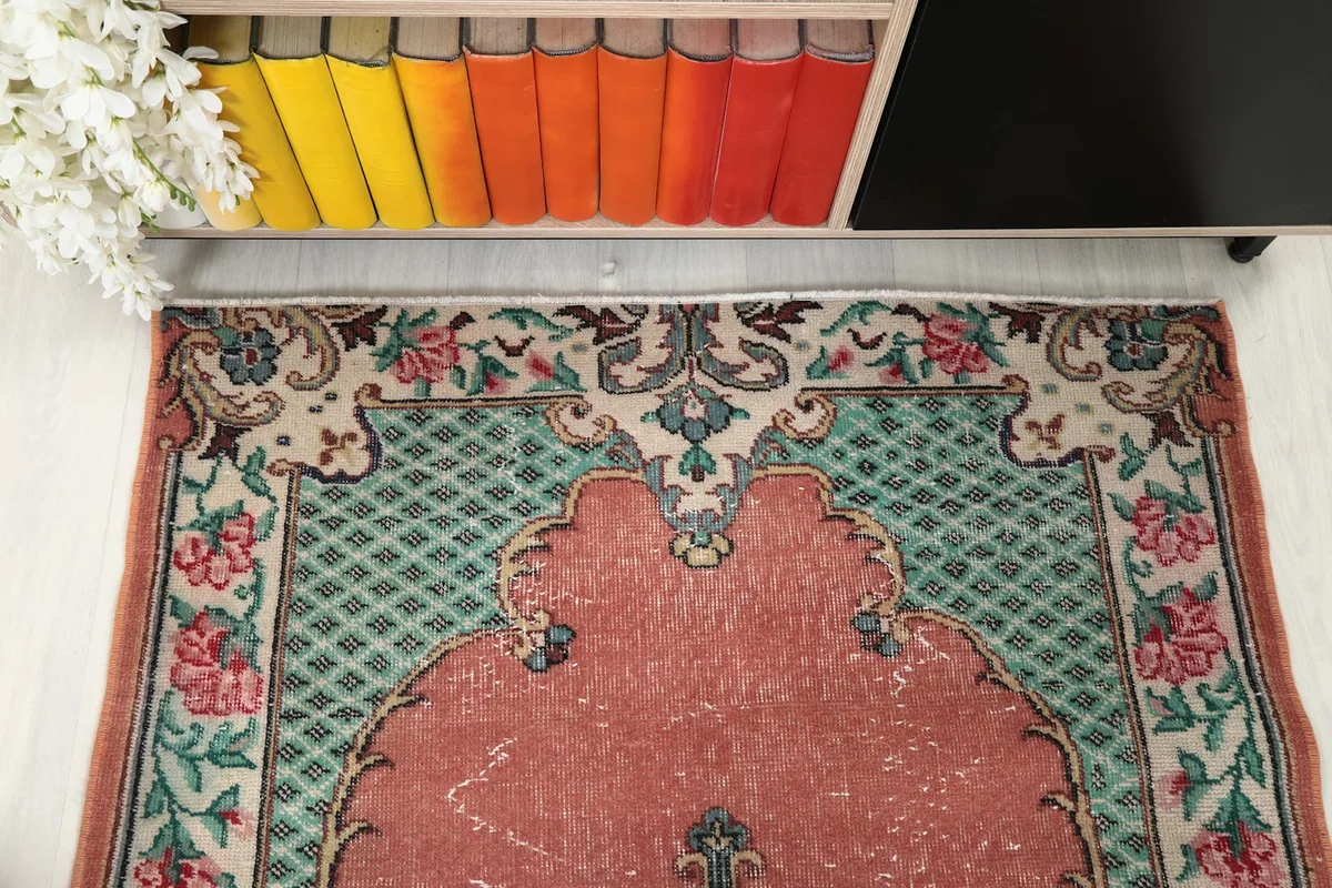 Overhead view showcasing the upper portion of the rug's design and colors
