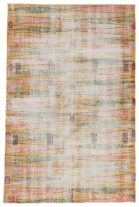 Full overhead view of the gold abstract vintage Anatolian rug on a white background
