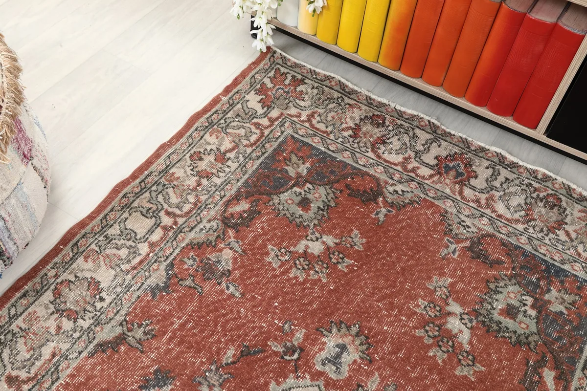 Corner detail showing the rug's border design and field patterns
