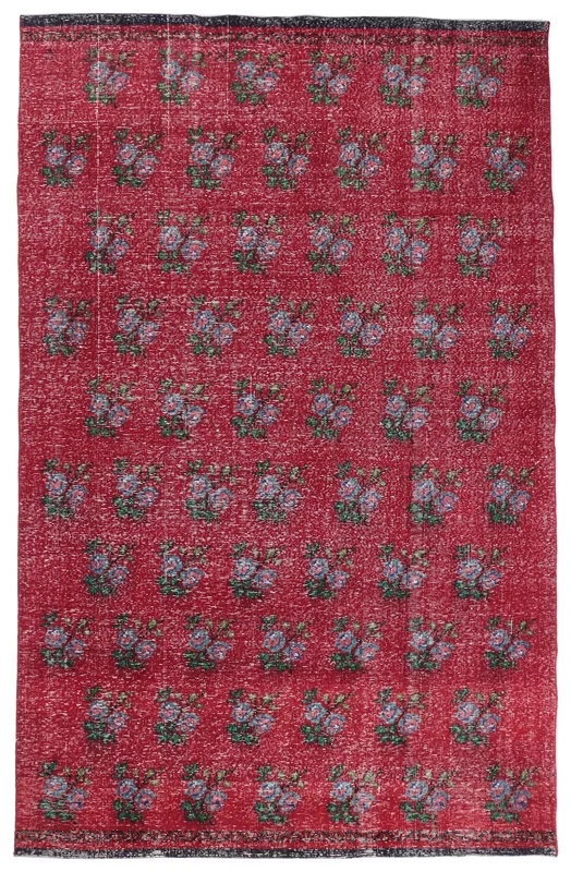 Full overhead view of the 6x10 red floral vintage Anatolian rug on a white background.