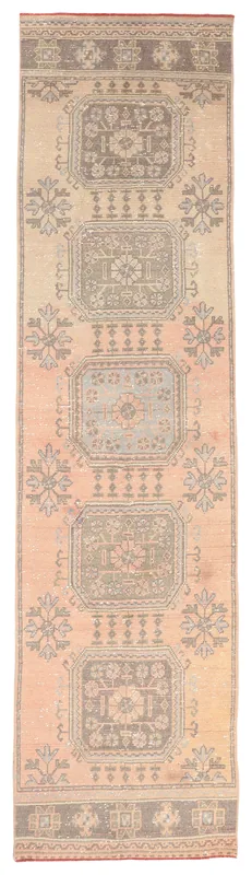 Full top view of the vintage 2'11" x 11'3" Anatolian runner rug on a white background.