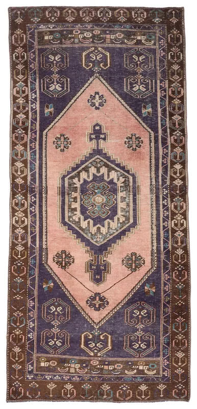 Full overhead view of the vintage rose and navy Anatolian area rug