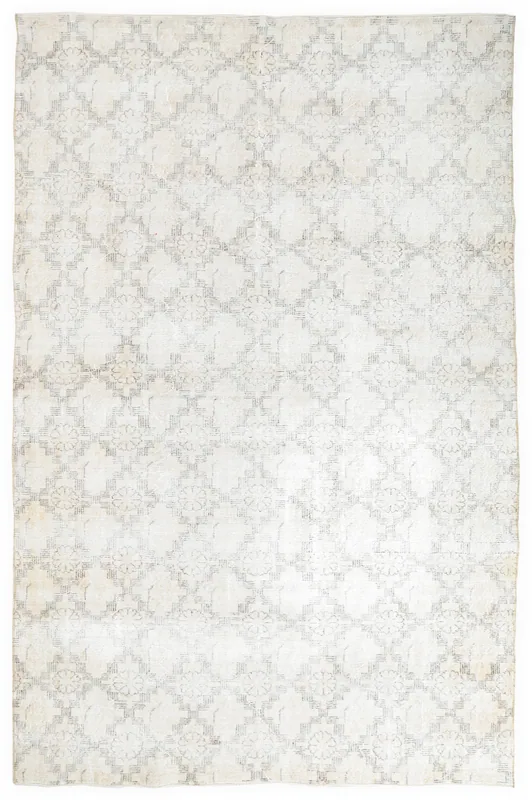 Full overhead view of the beige and gray geometric vintage Anatolian rug