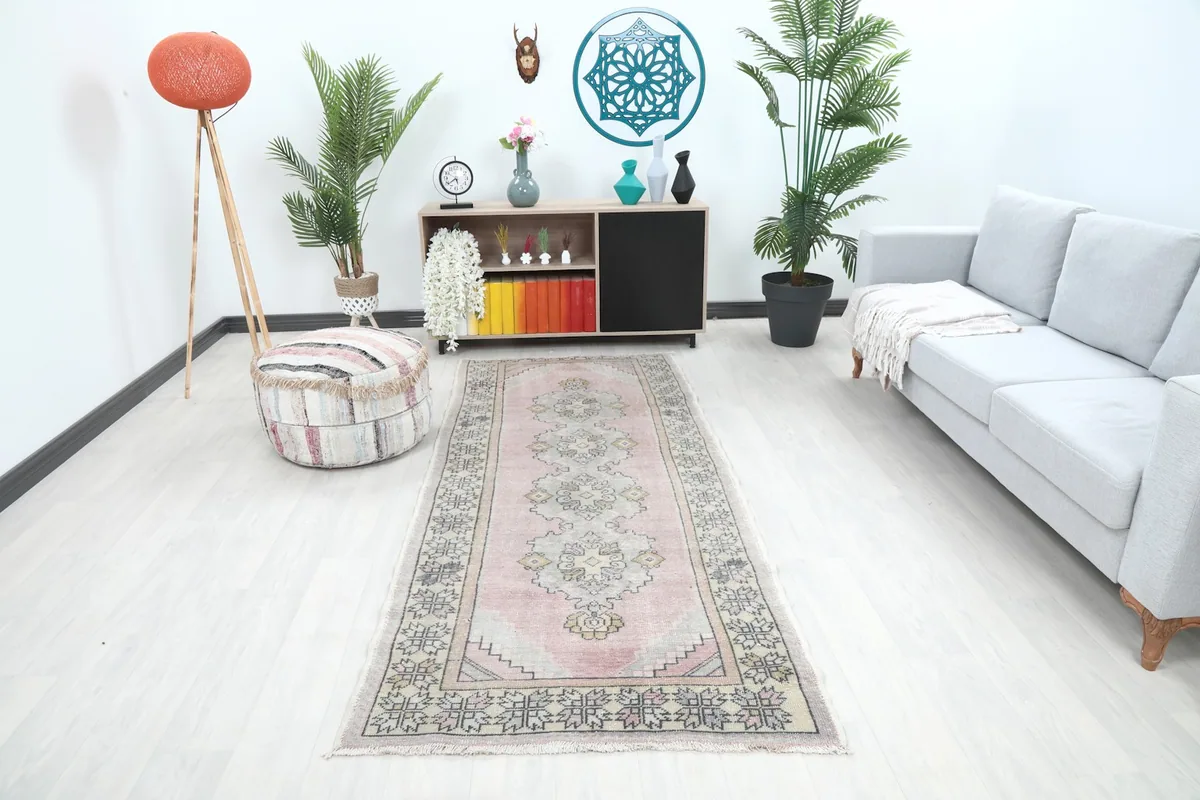Vintage rose runner displayed in a modern living room setting