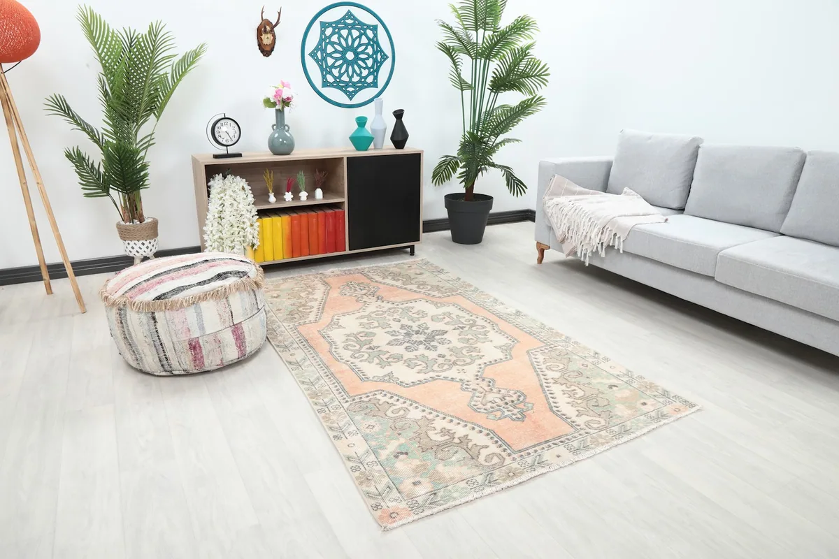 Angle view of the rug in a living room, highlighting the blend of its colors with contemporary decor